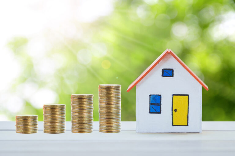 House,model,and,coin,money,on,table,for,finance,and