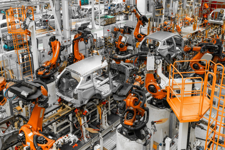 Automobile production line. welding car body. modern car assembly plant. top view