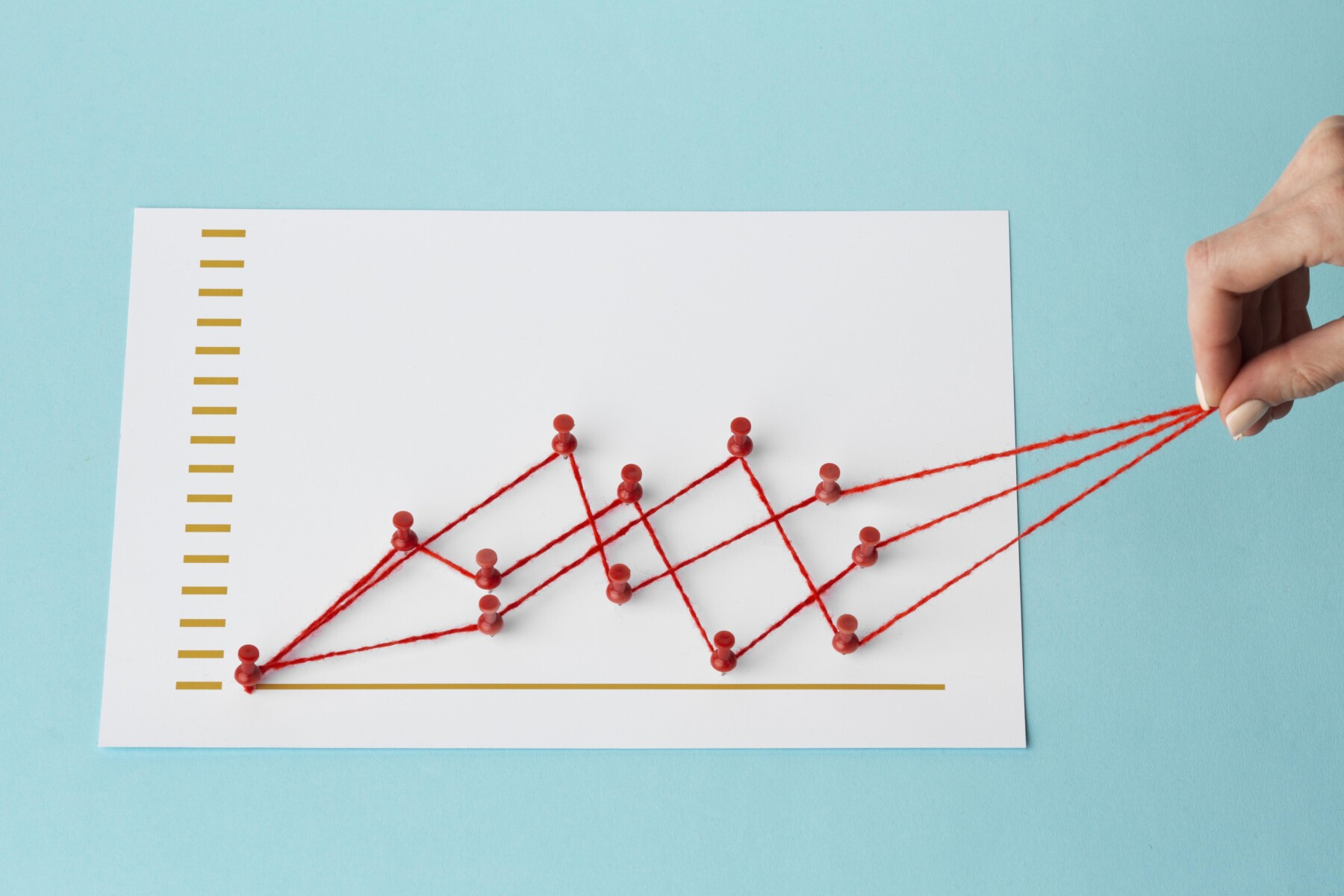 high-angle-chart-statistics-presentation-with-hand