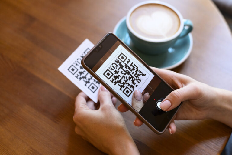 Person scanning qr code cafeteria