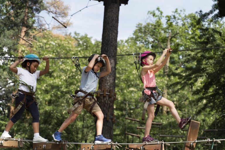 Courageous kids playing adventure park