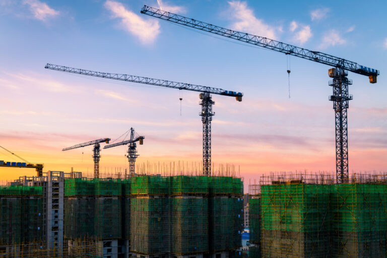 Construction site under sunset