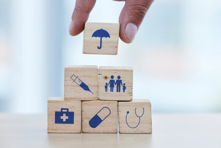 Hands Wood Building Blocks Table Insurance Healthcare Safe Healthy Foundation Hand Doctor Putting Small Wooden Block Object Icons With Umbrella Build Medical Investment