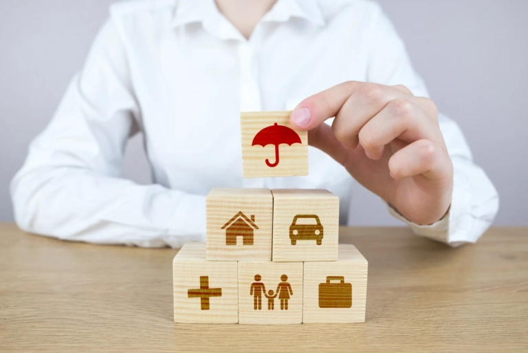 Healthcare Life Insurance Building Blocks With Hands Man Safety Medical Planning