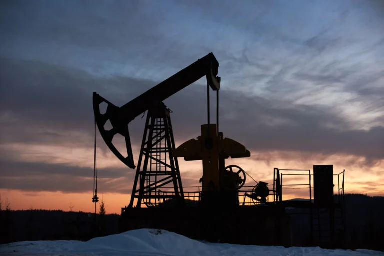 Beautiful sunset oil field with pump jack