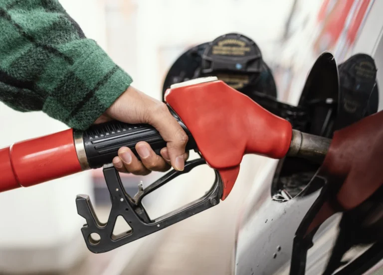 Man gas station with car close up