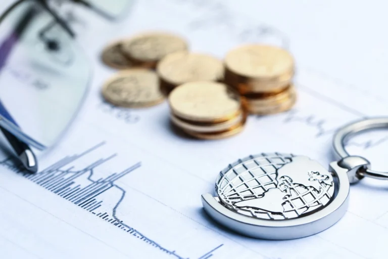 Coins paper money globe white statistic form background