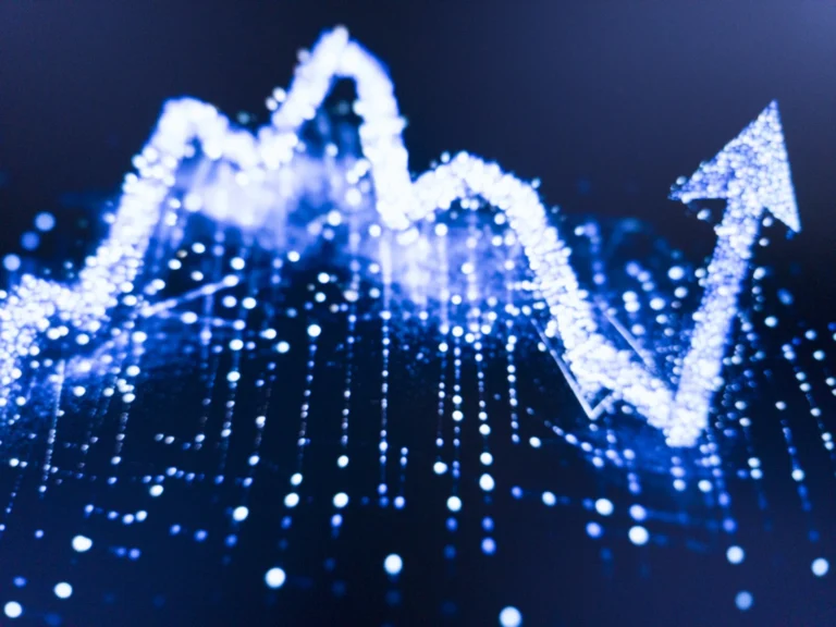 Abstract blue light bokeh depicting upward trending graph showing growth progress